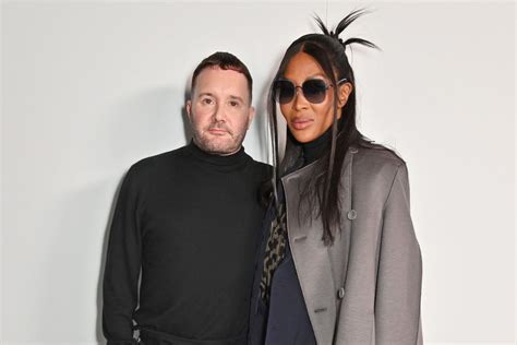 Naomi Campbell Wears Statement Coat at Dior 